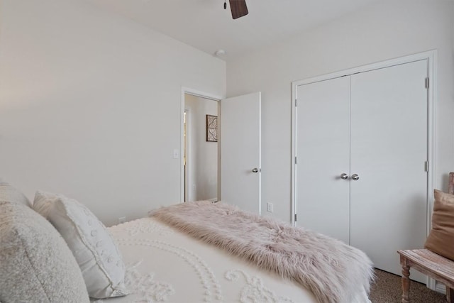 168 Pearl Way, Buda, TX 78610 - bedroom featuring a closet, a ceiling fan, and carpet