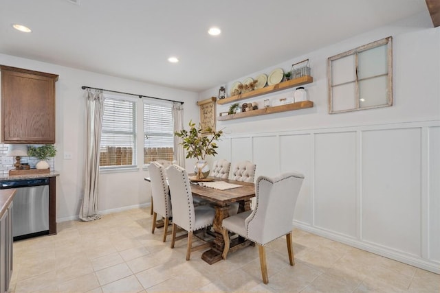 168 Pearl Way, Buda, TX 78610 - dining space with a decorative wall, recessed lighting, a wainscoted wall, and light tile patterned flooring