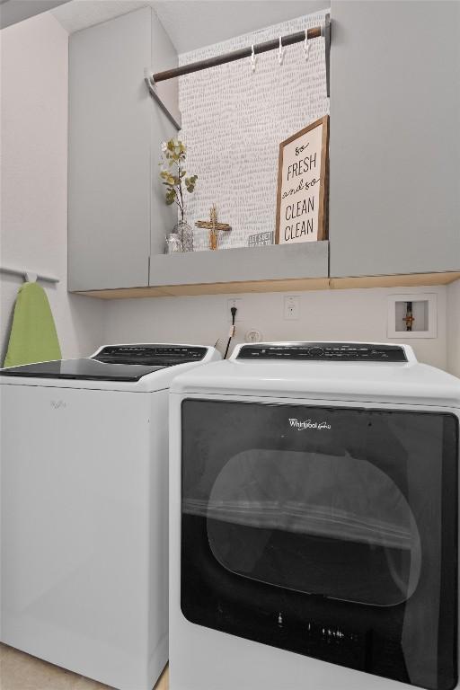 168 Pearl Way, Buda, TX 78610 - laundry room with washer and dryer
