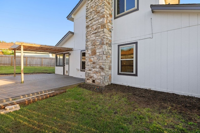 view of home's exterior with a patio area and a pergola