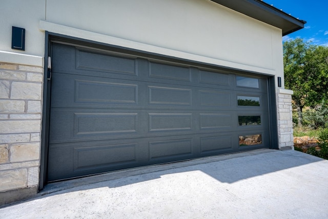 625 Desert Rose N, Horseshoe Bay, TX 78657 - garage featuring concrete driveway