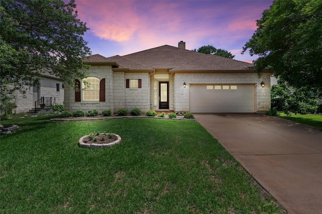 105 Longhorn Cavern Cv, Georgetown, TX 78633 - view of front of house with stone siding, a garage, a chimney, concrete driveway, and a lawn