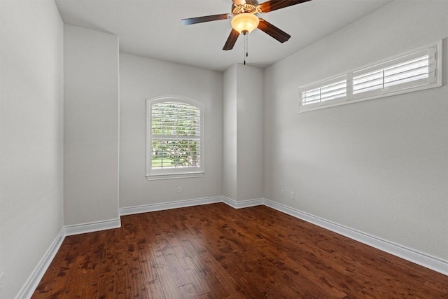 105 Longhorn Cavern Cv, Georgetown, TX 78633 - unfurnished room with dark wood-style floors, baseboards, and ceiling fan