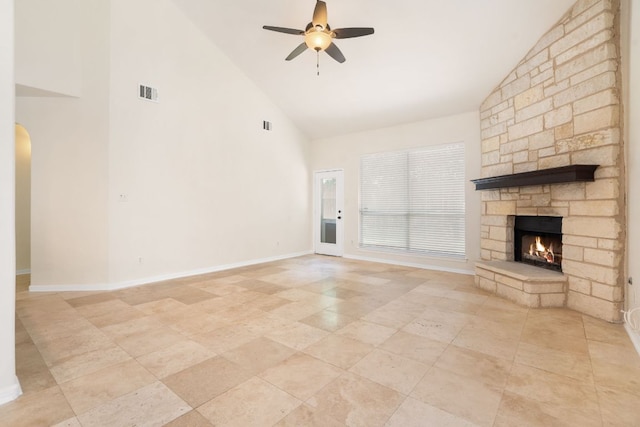 1345 Becca Teal Pl, Round Rock, TX 78681 - unfurnished living room featuring high vaulted ceiling, arched walkways, a ceiling fan, a fireplace, and light tile patterned flooring