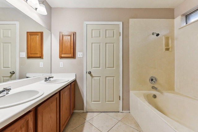 717 Blair Ave, Bastrop, TX 78602 - full bath featuring tile patterned flooring, double vanity, shower / bath combination, and baseboards