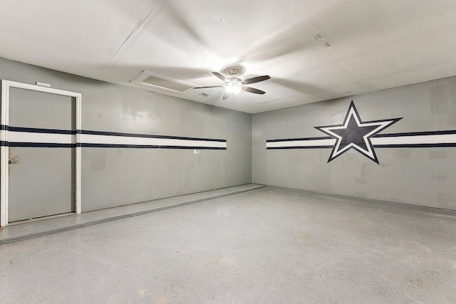 717 Blair Ave, Bastrop, TX 78602 - spare room with attic access and speckle patterned floor