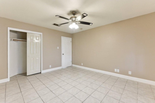 717 Blair Ave, Bastrop, TX 78602 - unfurnished bedroom featuring a closet, baseboards, and a ceiling fan
