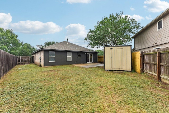 717 Blair Ave, Bastrop, TX 78602 - back of property featuring a patio