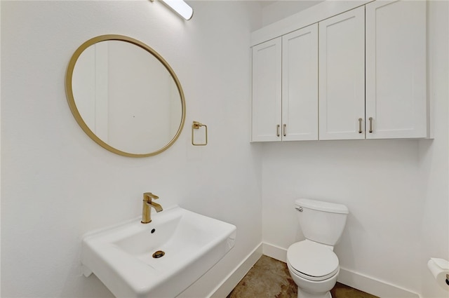 5506 Evans Ave Unit 1, Austin, TX 78751 - half bathroom with baseboards and a sink