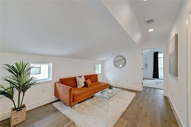 5506 Evans Ave Unit 1, Austin, TX 78751 - living room with wood finished floors, recessed lighting, and vaulted ceiling