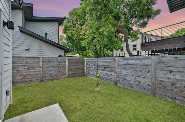 5506 Evans Ave Unit 1, Austin, TX 78751 - yard at dusk with a fenced backyard