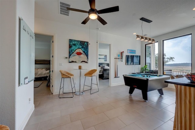 game room featuring a ceiling fan, pool table, and baseboards