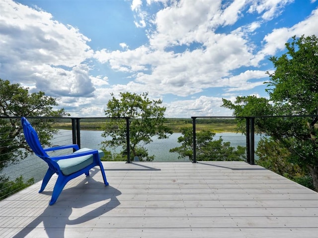 wooden terrace with a water view