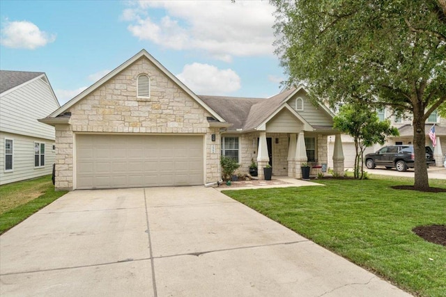 craftsman-style house featuring stone siding, concrete driveway, a garage, and a front lawn