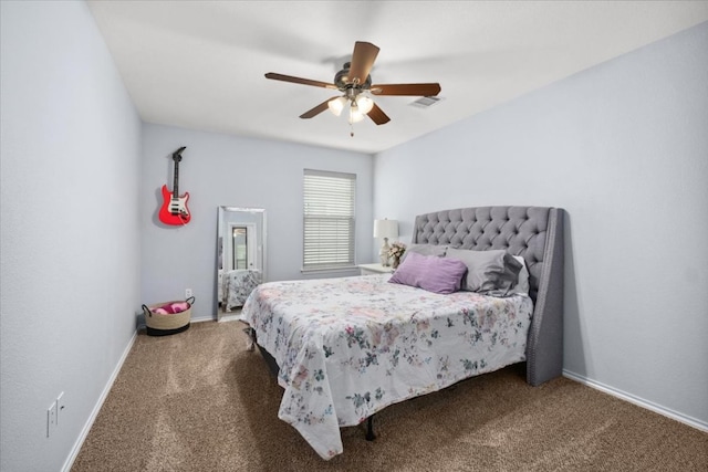 bedroom featuring carpet floors, baseboards, and ceiling fan