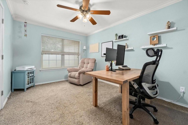 home office with ornamental molding, baseboards, carpet floors, and ceiling fan