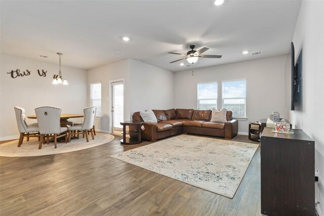 118 Ballyneal Ln, San Marcos, TX 78666 - living area with wood finished floors, ceiling fan, and recessed lighting