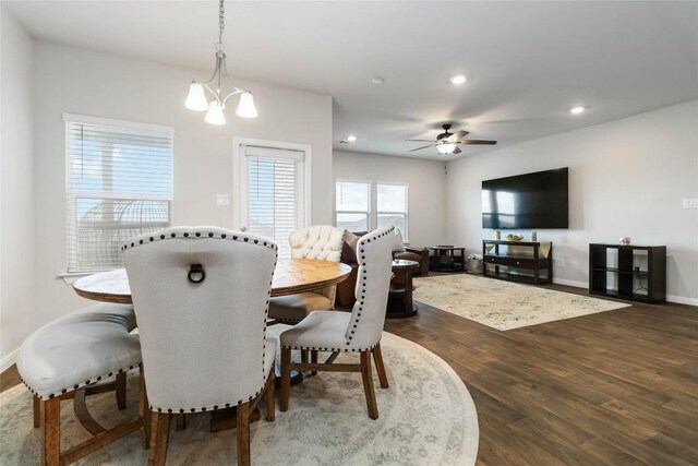 118 Ballyneal Ln, San Marcos, TX 78666 - dining area featuring dark wood finished floors, a chandelier, ceiling fan, and recessed lighting