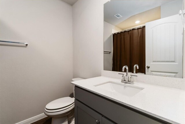118 Ballyneal Ln, San Marcos, TX 78666 - full bath with vanity, wood finished floors, and recessed lighting
