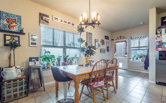 1714 Deodara Dr, Cedar Park, TX 78613 - tiled dining space featuring a chandelier and baseboards