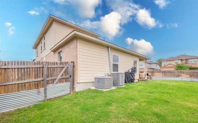 1714 Deodara Dr, Cedar Park, TX 78613 - rear view of house with a fenced backyard