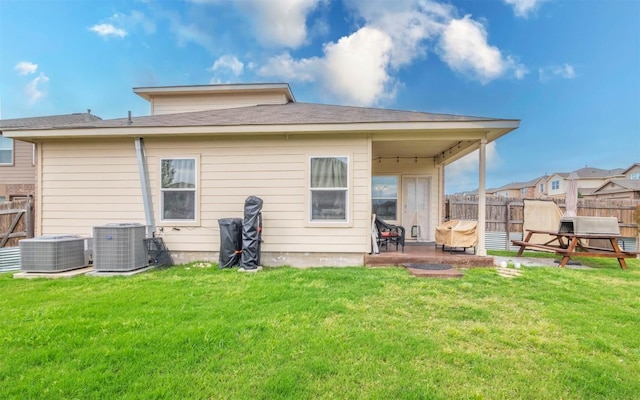 1714 Deodara Dr, Cedar Park, TX 78613 - back of house featuring central AC and a patio area