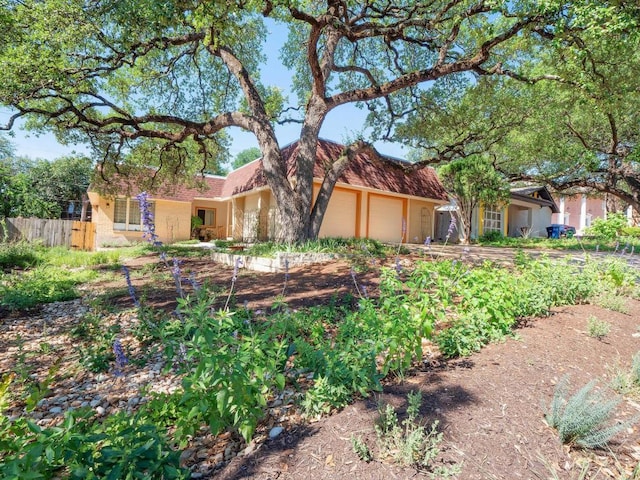 3513 Westchester Ave, Austin, TX 78759 - view of front of house featuring an attached garage and fence