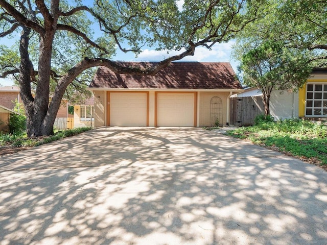3513 Westchester Ave, Austin, TX 78759 - view of front of property with fence, driveway, and brick siding