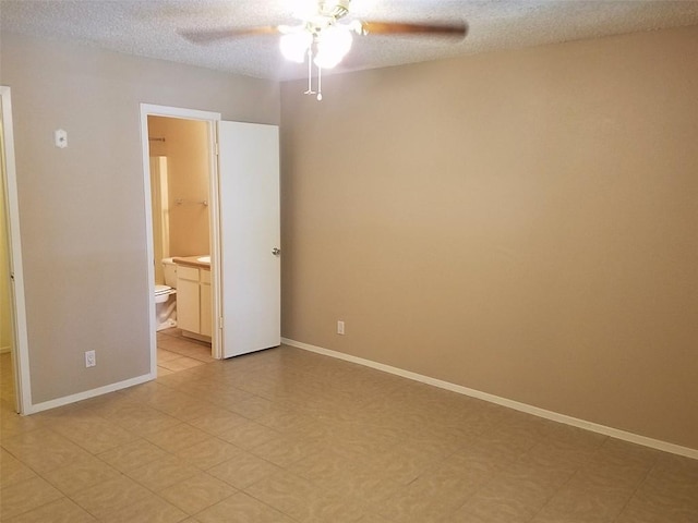 3513 Westchester Ave, Austin, TX 78759 - empty room featuring a ceiling fan, a textured ceiling, and baseboards