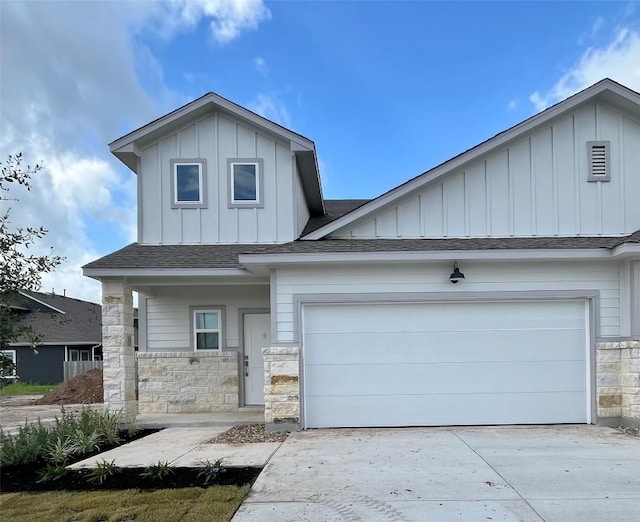 8525 Wellspring Loop, Round Rock, TX 78665 - craftsman inspired home with board and batten siding, a shingled roof, stone siding, concrete driveway, and a garage
