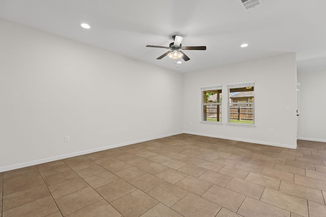 unfurnished room featuring a ceiling fan, recessed lighting, and baseboards