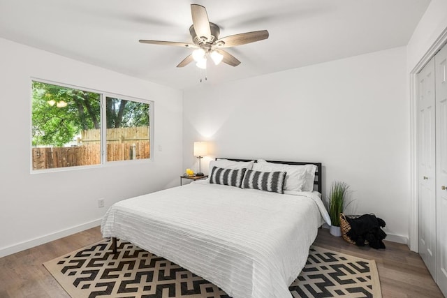 2506 Carlow Dr, Austin, TX 78745 - bedroom featuring wood finished floors, a closet, baseboards, and a ceiling fan