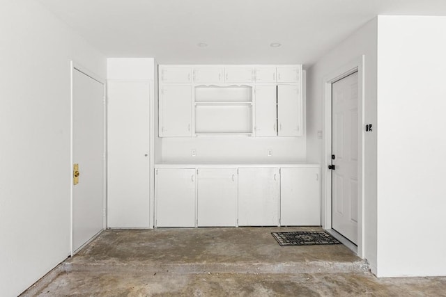 interior space with concrete floors