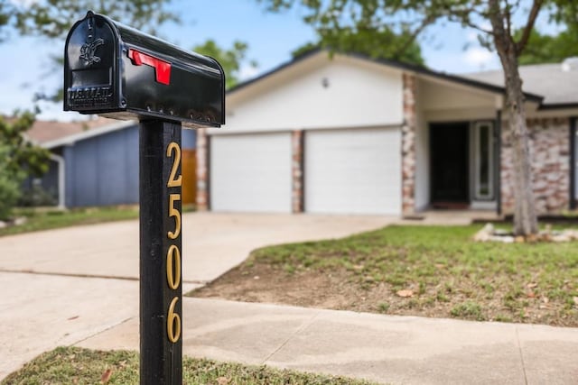 2506 Carlow Dr, Austin, TX 78745 - view of front of house featuring an attached garage and driveway