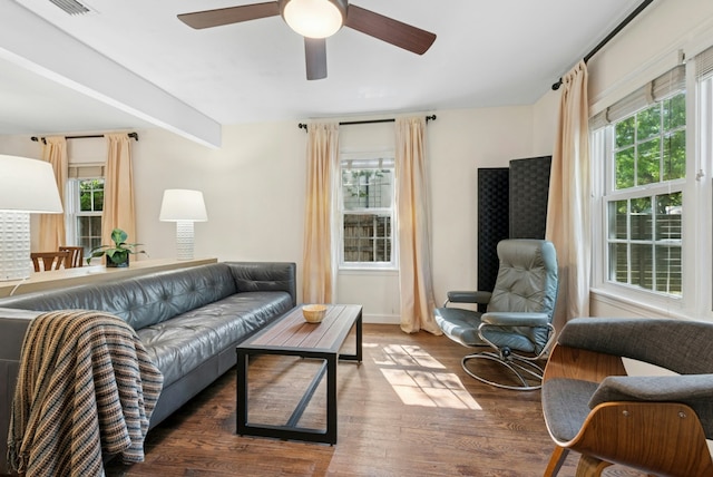 2603 Hidalgo St, Austin, TX 78702 - living area with wood finished floors and ceiling fan