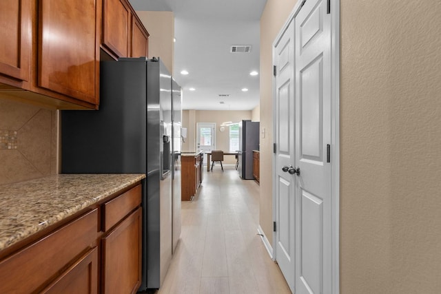 18808 Wind Valley Way, Pflugerville, TX 78660 - hall featuring recessed lighting and light wood-style floors