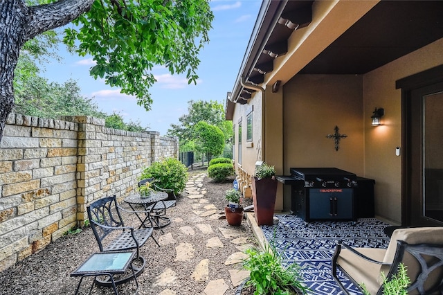 104 Rivalto Cir Unit 1, Lakeway, TX 78734 - view of patio / terrace featuring area for grilling