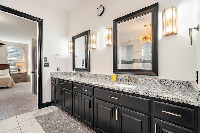 225 Escarpment Way, Cedar Park, TX 78613 - full bathroom featuring marble finish flooring, ensuite bathroom, and double vanity