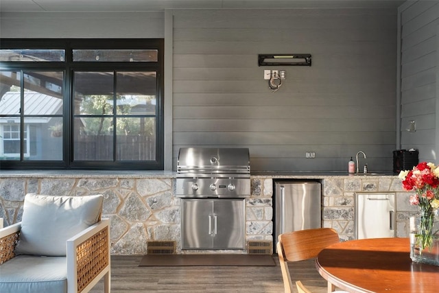 225 Escarpment Way, Cedar Park, TX 78613 - view of patio / terrace with exterior kitchen, a grill, and a sink
