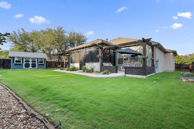 225 Escarpment Way, Cedar Park, TX 78613 - rear view of house with a sunroom, an outbuilding, and a storage unit