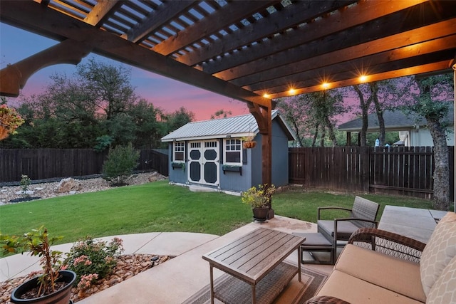 225 Escarpment Way, Cedar Park, TX 78613 - patio terrace at dusk with an outdoor structure, an outdoor living space, a shed, and a pergola