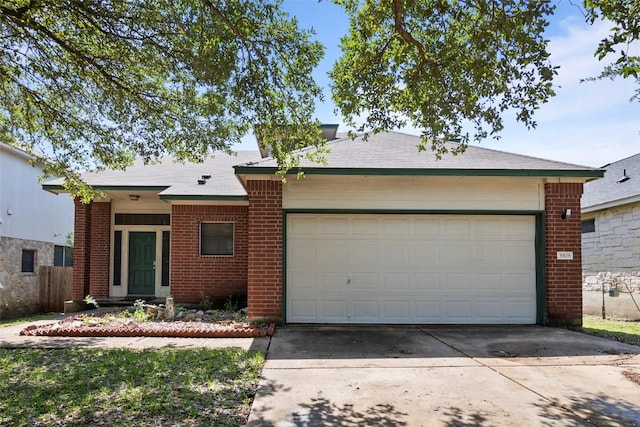 3908 Whitey Ford Way, Round Rock, TX 78665 - single story home with brick siding, driveway, and a garage