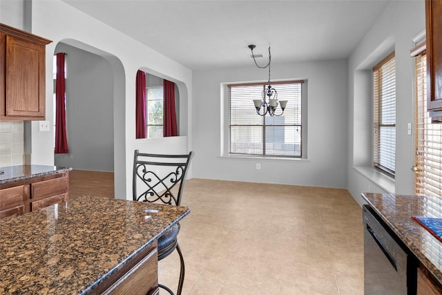 3908 Whitey Ford Way, Round Rock, TX 78665 - kitchen with dishwasher, healthy amount of natural light, and arched walkways