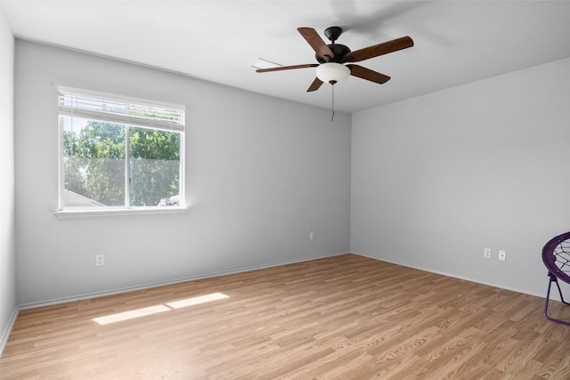 3908 Whitey Ford Way, Round Rock, TX 78665 - spare room featuring light wood finished floors and a ceiling fan