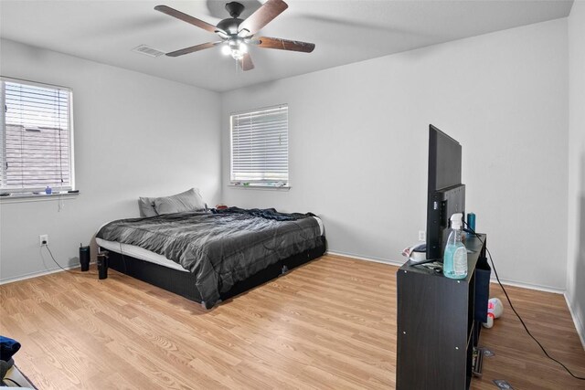 3908 Whitey Ford Way, Round Rock, TX 78665 - bedroom featuring wood finished floors and ceiling fan