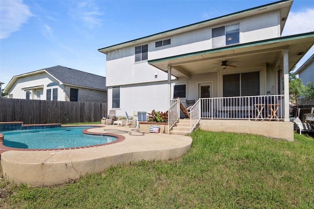 back of house with ceiling fan, a patio, and stucco siding