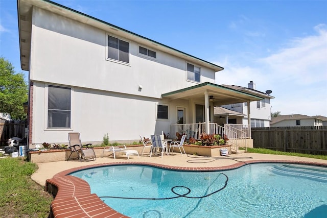 3908 Whitey Ford Way, Round Rock, TX 78665 - rear view of house with a patio area and stucco siding