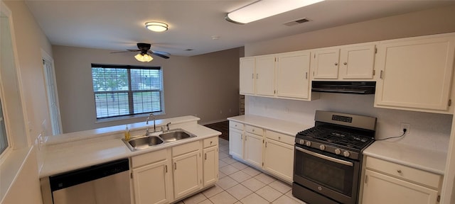 195 Cardinal Dr, Paige, TX 78659 - kitchen featuring stainless steel appliances, range hood, a sink, a ceiling fan, and white cabinets
