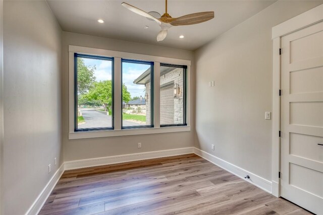 106 Edwards Cir, Horseshoe Bay, TX 78657 - empty room featuring a ceiling fan, light wood-style flooring, recessed lighting, and baseboards