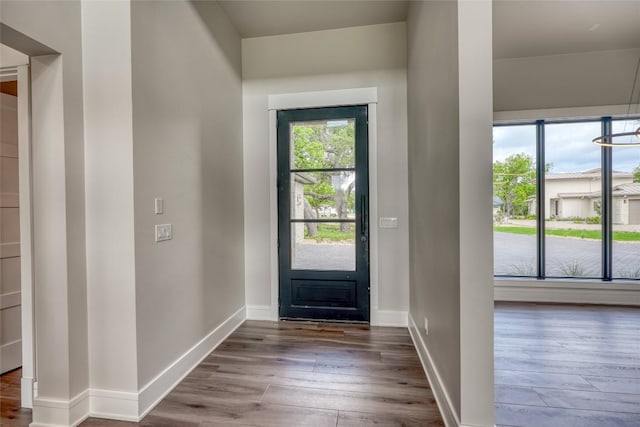 106 Edwards Cir, Horseshoe Bay, TX 78657 - doorway to outside with wood finished floors and baseboards